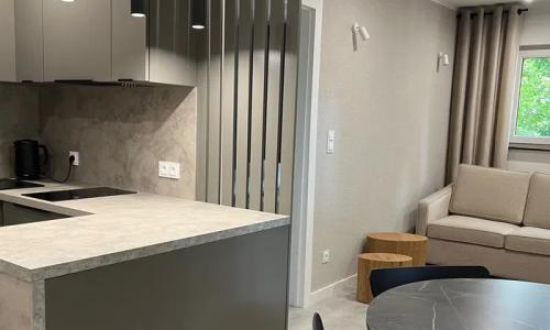 Domki , pokoje , apartenty . Wypocznij nad jeziorem z Apartamentami Orla
